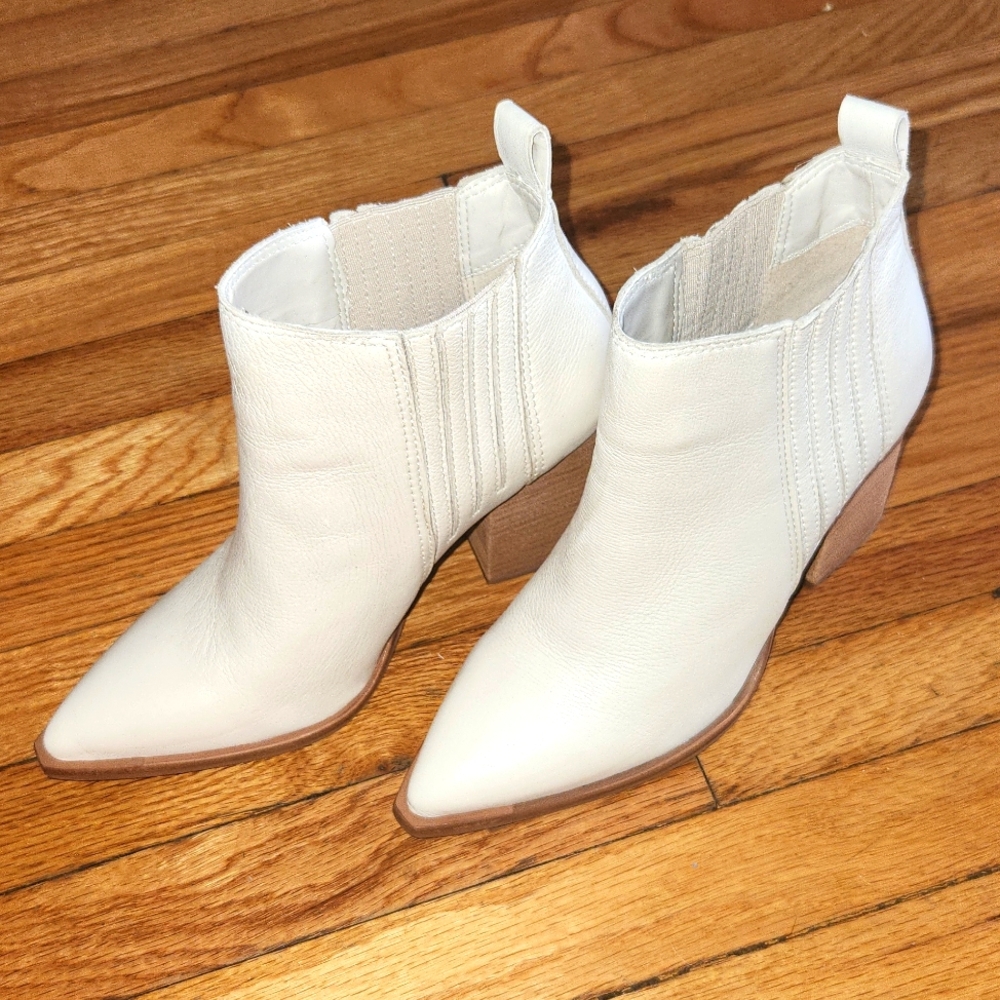 A cute white bottie not worn but I did try on few times can seem to style it